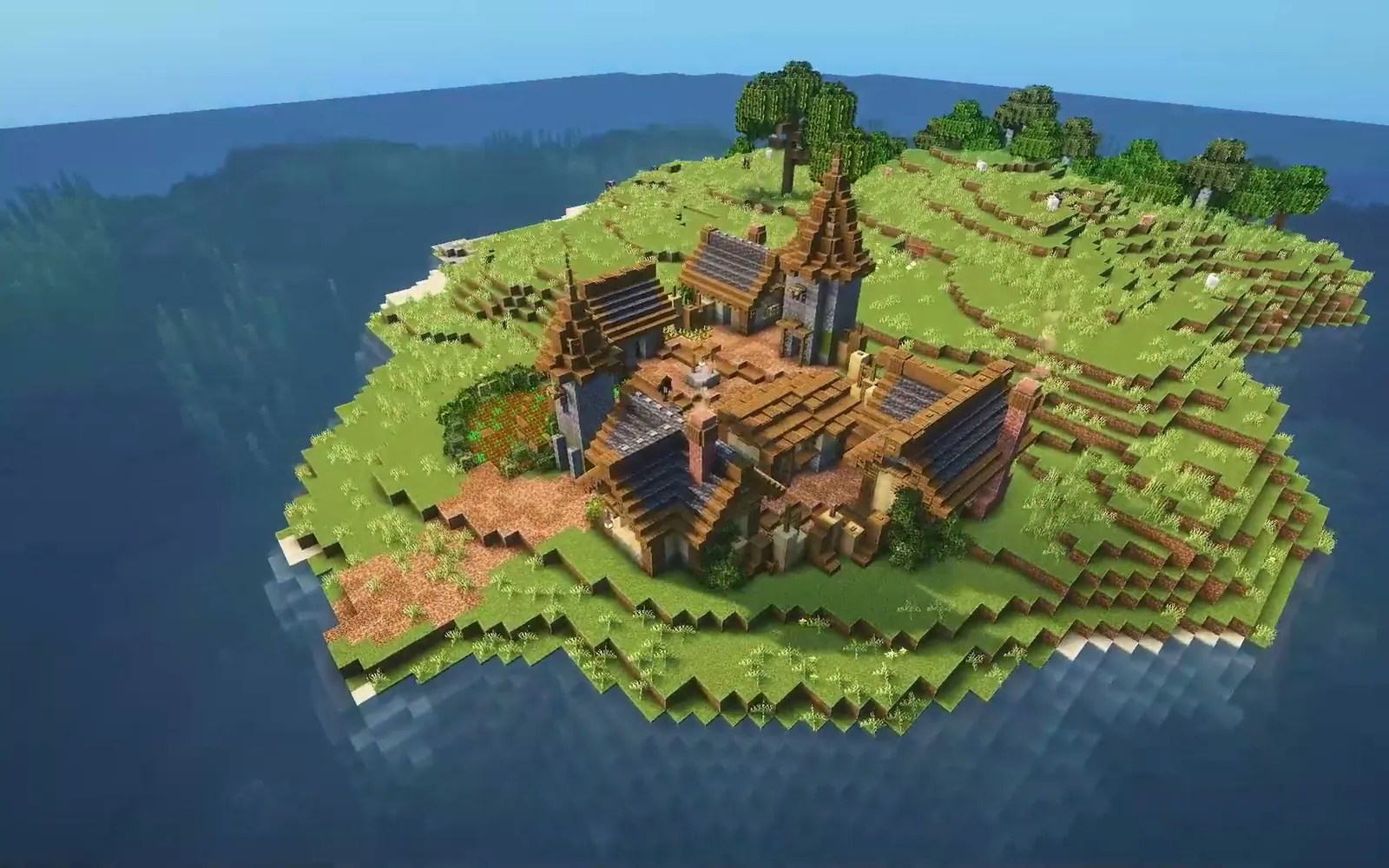 A small Minecraft island with a medieval village, seen from above.